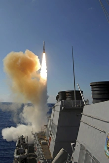 The Arleigh Burke-class guided missile destroyer USS Stout launching a SM-2 Standard The Arleigh Burke-class guided missile destroyer USS Stout launching a SM-2 Standard