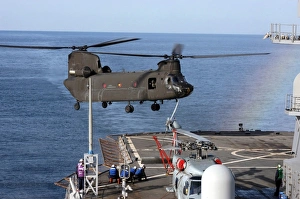 An Army CH-47 Chinook pulls in for a landing aboard USS Blue Ridge An Army CH-47 Chinook pulls in for a landing aboard USS Blue Ridge