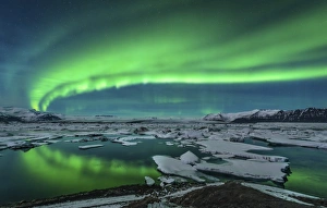 Aurora borealis over the glacial lagoon Jokulsarlon in Iceland Aurora borealis over the glacial lagoon Jokulsarlon in Iceland