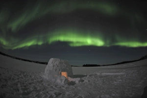 Aurora borealis over an igloo on Walsh Lake, Canada Aurora borealis over an igloo on Walsh Lake, Canada