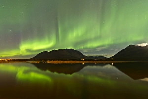 Aurora borealis over mountain, Carcross, Yukon, Canada Aurora borealis over mountain, Carcross, Yukon, Canada