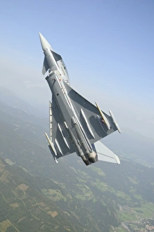 An Austrian Air Force EF2000 Typhoon over the Austrian Alps An Austrian Air Force EF2000 Typhoon over the Austrian Alps