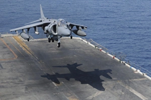 An AV-8B Harrier aircraft lands on the flight deck of USS Peleliu An AV-8B Harrier aircraft lands on the flight deck of USS Peleliu