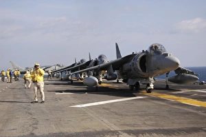 Four AV-8B Harrier jets line up for take-off aboard USS Essex Four AV-8B Harrier jets line up for take-off aboard USS Essex