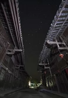 The Big Dipper seen through the alley way of a street in China