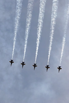 The Blue Angels perform aerial demonstrations during an air show The Blue Angels perform aerial demonstrations during an air show