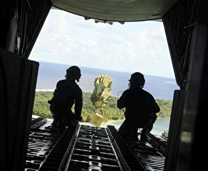 A box of humanitarian goods travels to the Yap Islands during Operation Christmas Drop A box of humanitarian goods travels to the Yap Islands during Operation Christmas Drop