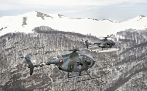 Two Breda Nardi NH-500 helicopters of the Italian Air Force over Frosinone, Italy Two Breda Nardi NH-500 helicopters of the Italian Air Force over Frosinone, Italy