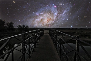 Bridge on a distant planet near the Triangulum Galaxy Bridge on a distant planet near the Triangulum Galaxy