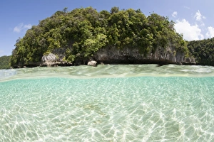 Bright sunlight dances across a shallow sand seafloor in Palaus lagoon Bright sunlight dances across a shallow sand seafloor in Palaus lagoon