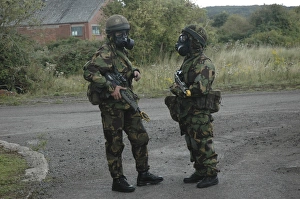 Two British soldiers in full NBC protection gear Two British soldiers in full NBC protection gear