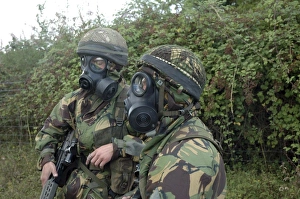 British soldiers in full NBC protection gear and a S6 respirator British soldiers in full NBC protection gear and a S6 respirator