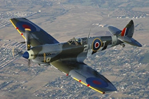 British Supermarine Spitfire Mk-16 flying over Chino, California British Supermarine Spitfire Mk-16 flying over Chino, California