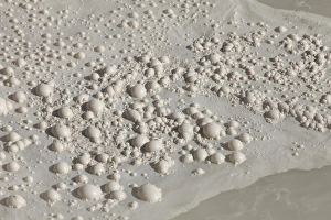 Bubbles on surface of Sulphur Cauldron hot spring, Yellowstone National Park, Wyoming Bubbles on surface of Sulphur Cauldron hot spring, Yellowstone National Park, Wyoming