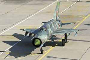 A Bulgarian Air Force MiG-21bis jet fighter taxiing A Bulgarian Air Force MiG-21bis jet fighter taxiing