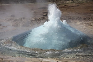 Bursting water bubble at onset of eruption of Strokkur Geysir, Iceland Bursting water bubble at onset of eruption of Strokkur Geysir, Iceland