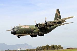 C-130 Hercules from the Hellenic Air Force landing at Decimomannu Air Base, Italy C-130 Hercules from the Hellenic Air Force landing at Decimomannu Air Base, Italy
