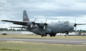 Images Dated 21st July 2007: A C-130 Hercules lands at McChord Air Force Base, Washington