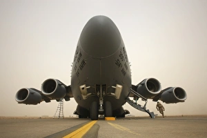 A C-17 Globemaster III sits on the runway at COB Speicher, Iraq A C-17 Globemaster III sits on the runway at COB Speicher, Iraq