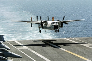 A C-2A Greyhound prepares to land on the flight deck of USS Dwight D. Eisenhower A C-2A Greyhound prepares to land on the flight deck of USS Dwight D. Eisenhower