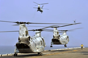 CH-46E Sea Knight helicopters take off from USS Bonhomme Richard CH-46E Sea Knight helicopters take off from USS Bonhomme Richard