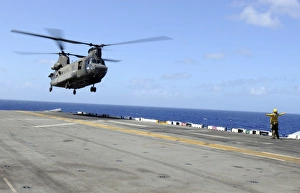 A CH-47 Chinook helicopter landing aboard USS Wasp A CH-47 Chinook helicopter landing aboard USS Wasp
