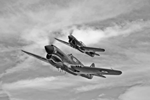 Two Curtiss P-40 Warhawks in flight near Nampa, Idaho Two Curtiss P-40 Warhawks in flight near Nampa, Idaho