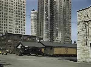 Diesel switch engine moving freight cars at the Illinois Central Railroad in Chicago Diesel switch engine moving freight cars at the Illinois Central Railroad in Chicago