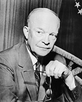 Digitally restored photo of Dwight Eisenhower holding a pair of glasses Digitally restored photo of Dwight Eisenhower holding a pair of glasses