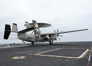 An E-2C Hawkeye launches off the flight deck of USS Abraham Lincoln An E-2C Hawkeye launches off the flight deck of USS Abraham Lincoln