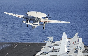 An E-2C Hawkeye launches off the flight deck of USS Nimitz An E-2C Hawkeye launches off the flight deck of USS Nimitz