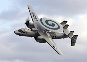 An E-2C Hawkeye performs a fly-by during an air power demonstration An E-2C Hawkeye performs a fly-by during an air power demonstration