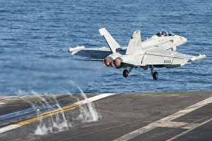 An EA-18G Growler launches from the flight deck of USS Harry S. Truman An EA-18G Growler launches from the flight deck of USS Harry S. Truman