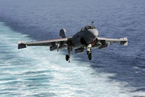 An EA-6B Prowler lands aboard the aircraft carrier USS John C. Stennis An EA-6B Prowler lands aboard the aircraft carrier USS John C. Stennis