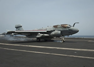 An EA-6B Prowler lands on the flight deck of USS Nimitz An EA-6B Prowler lands on the flight deck of USS Nimitz