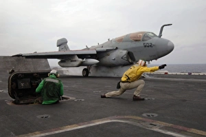 An EA-6B Prowler launches off the flight deck of USS Kitty Hawk An EA-6B Prowler launches off the flight deck of USS Kitty Hawk