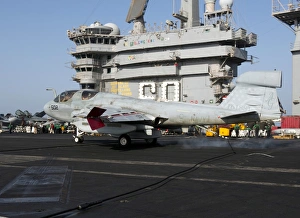 An EA-6B Prowler makes an arrested landing aboard USS Dwight D. Eisenhower An EA-6B Prowler makes an arrested landing aboard USS Dwight D. Eisenhower