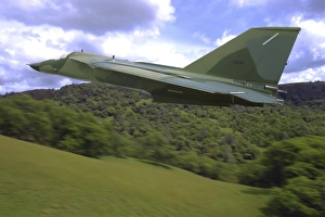 F-111 Aardvark flying over Sacramento Mountains, California F-111 Aardvark flying over Sacramento Mountains, California