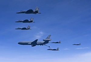 Six F-15 Eagles refuel from a KC-10 Extender Six F-15 Eagles refuel from a KC-10 Extender
