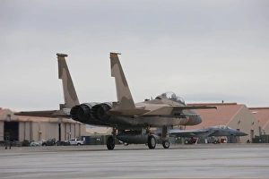 An F-15C Eagle taxis to the runway at Nellis Air Force Base, Nevada An F-15C Eagle taxis to the runway at Nellis Air Force Base, Nevada