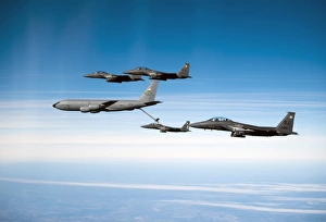 A F-15E Strike Eagle is refueled by a KC-135 Stratotanker A F-15E Strike Eagle is refueled by a KC-135 Stratotanker