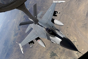 An F-16 Fighting Falcon receives fuel from a KC-135 Stratotanker An F-16 Fighting Falcon receives fuel from a KC-135 Stratotanker