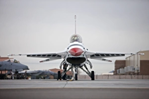 An F-16C Thunderbird sits on the ramp at Nellis Air Force Base, Nevada An F-16C Thunderbird sits on the ramp at Nellis Air Force Base, Nevada