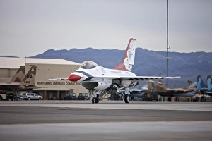 An F-16C Thunderbird taxis to the runway at Nellis Air Force Base, Nevada An F-16C Thunderbird taxis to the runway at Nellis Air Force Base, Nevada