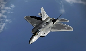 A F-22 Raptor returns to a mission after refueling A F-22 Raptor returns to a mission after refueling