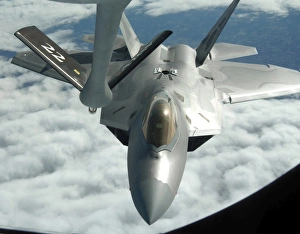 An F-22A Raptor refuels with a KC-135 Stratotanker An F-22A Raptor refuels with a KC-135 Stratotanker
