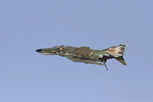 An F-4 Phantom in flight over Houston, Texas An F-4 Phantom in flight over Houston, Texas