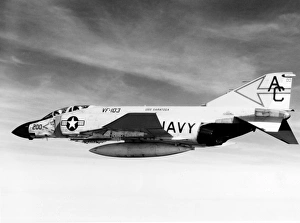 An F-4J Phantom fighter aircraft flying over the Mediterranean An F-4J Phantom fighter aircraft flying over the Mediterranean