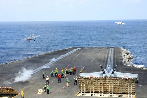 Two F/A-18 Hornets take off from the aircraft carrier USS Ronald Reagan Two F/A-18 Hornets take off from the aircraft carrier USS Ronald Reagan