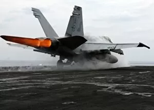 Images Dated 19th March 2006: An F / A-18C Hornet launches from the flight deck aboard USS Enterprise